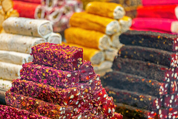 Set of multicolored turkish locum with nougat, nuts and barbery. Sweets and traditional oriental...