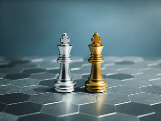 Golden and silver king, luxury chess pieces standing together on a silver hexagon pattern chessboard on blue background. Leader, friend, enemy, cooperation, partnership, and business strategy concept.