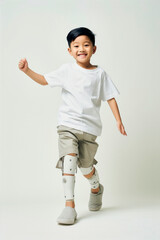 asian kid with prosthetic legs trying to walk again, rehabilitation