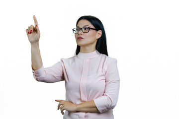 Smart asian woman pointing at invisible virtual screen. Isolated on white background.
