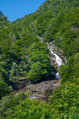 Fototapeta na wymiar Waterfall in the Verzasca Valley, Canton Ticino. Switzerland, Europe