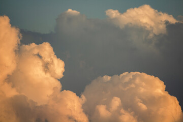 Clouds at sunset. Sunset color. Sunlight. Paradise in the sky. Heaven.