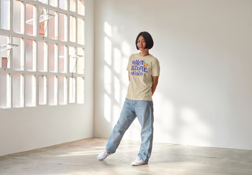 Mockup of Japanese woman wearing customizable color t-shirt, full length