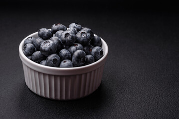 Delicious fresh sweet blueberries in a ceramic bowl. Vegan food