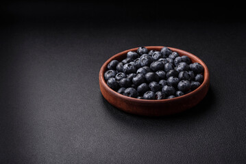Delicious fresh sweet blueberries in a ceramic bowl. Vegan food