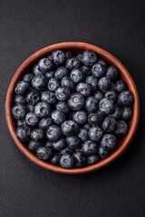 Delicious fresh sweet blueberries in a ceramic bowl. Vegan food