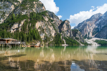 The lake is clear, sometimes green, sometimes blue, and surrounded by mountains. Nature's...