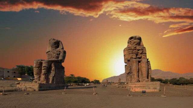 Colossi of Memnon, two massive stone statues representing the pharaoh, Luxor, Egypt