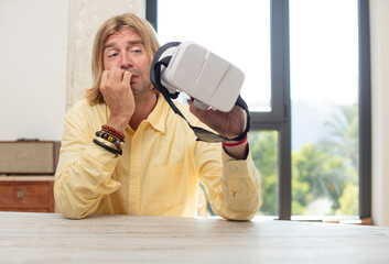 young adult caucasian man feeling scared, worried or angry and looking to the side. virtual glasses concept