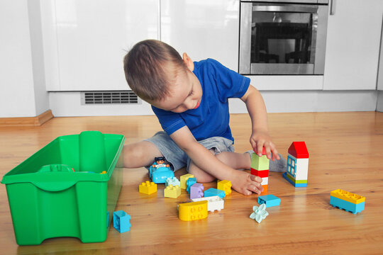child plays constructor. Motor skills, logic, creativity, games for children