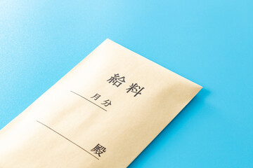 青背景に給料袋