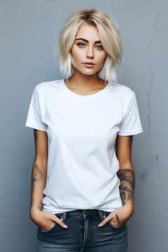 Oversize white style t-shirt mockup photo with beautiful girl with tattoos and light concrete background