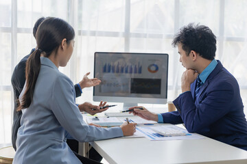 A group of successful young business people present financial reports at meetings and brainstorm ideas to analyze and plan business strategies.