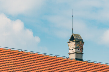 Chimney on the roof with lightning rod