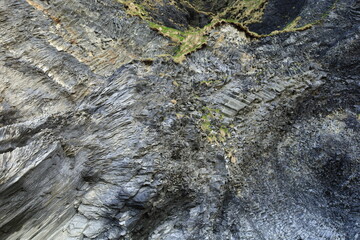 View on Reynisdrangar which are basalt sea stacks situated under the mountain Reynisfjall near the village Vík í Mýrdal in southern Iceland.