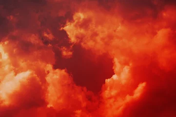 Fototapete Backstein The red sky background looked like smoke and fire. bomb Violent. for wallpaper, backdrop and design.