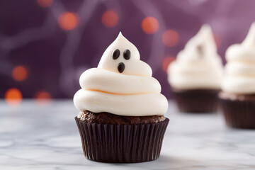 Halloween cupcakes with ghost topping decoration