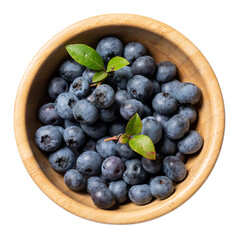 Fresh ripe blueberry berries in wooden bowl isolated on white background. Top view.