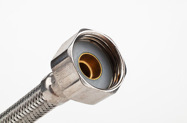 Close-up of a plumbing connector isolated on a white background.