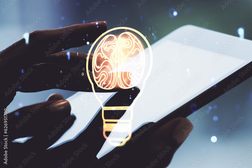 Poster creative light bulb with human brain hologram and hand working with a digital tablet on background, 
