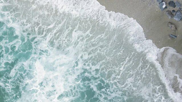 Drone 4k aerial top down view of Mylopotamos beach Pelion Greece summer