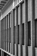 Side View of a Brick Building Wall with Facade.