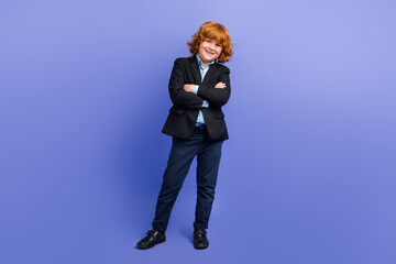 Full size photo of cheerful successful pupil boy crossed arms posing classy uniform isolated on violet color background