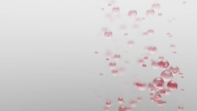 Rising up bubbles pink on white background and copy space