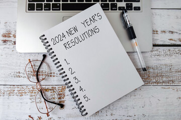 2024 New Year's Resolution Text on Note Pad