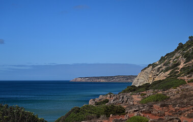 Fototapeta na wymiar Ocean Cove, Cliffs and Rocks near Salema Beach Algarve Portugal