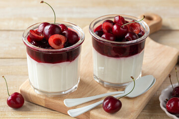 sweet cherry jelly mousse dessert in glass