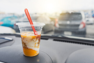 Hard-boiled eggs in plastic cup ready to eat in the car from the shop grilled eggs (kai bing)...