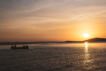 Fototapeta na wymiar People watching sunset over lake Nicaragua