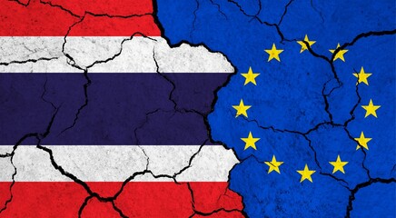 Flags of Thailand and European Union on cracked surface - politics, relationship concept