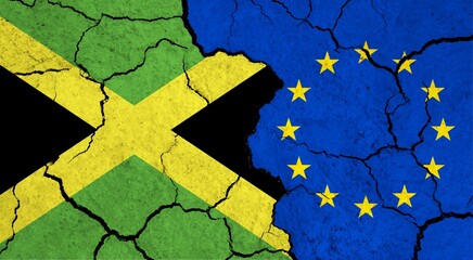 Flags of Jamaica and European Union on cracked surface - politics, relationship concept