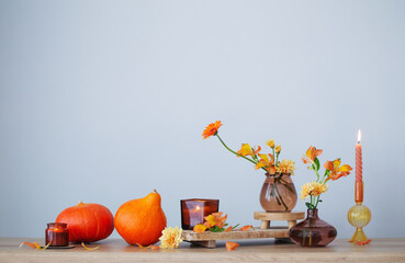 Obraz na płótnie Canvas autumn still life on wooden shelf on background wall