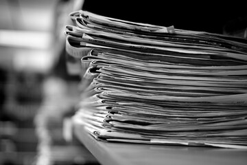 Stacks of Old Newspapers Printed Paper with News Headlines