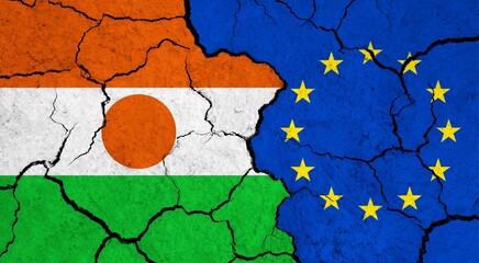 Flags of Niger and European Union on cracked surface - politics, relationship concept