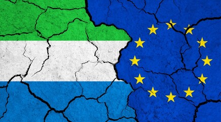 Flags of Sierra Leone and European Union on cracked surface - politics, relationship concept