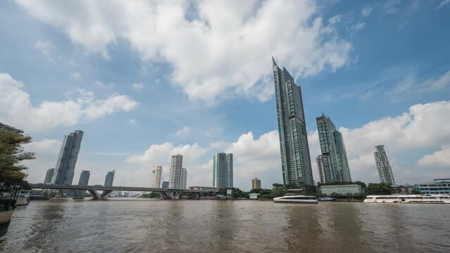 Bangkok city skyline timelapse at city center and Chao Phraya River, Thailand 4K time lapse