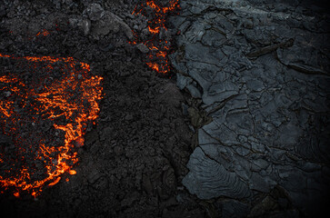 Aerial view of the texture of a solidifying lava field, close-up - obrazy, fototapety, plakaty
