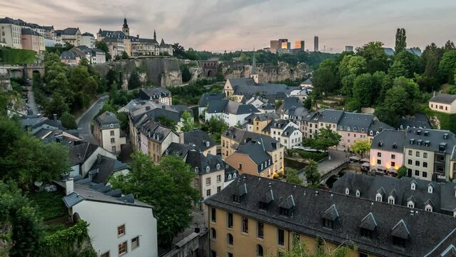 Grand Duchy of Luxembourg city skyline day to night time lapse at Alzette river