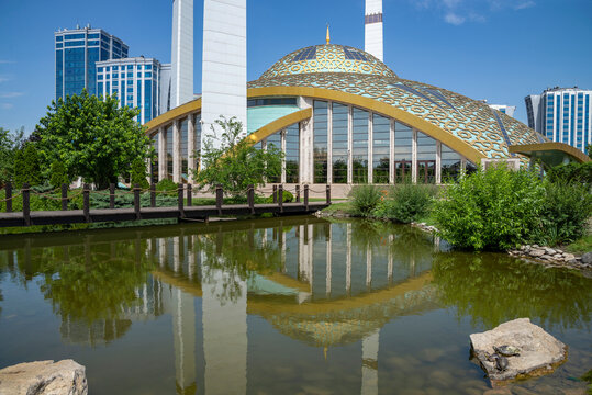 ARGUN, RUSSIA - JUNE 14, 2023: Mother's Heart Mosque with reflection. Chechen Republic