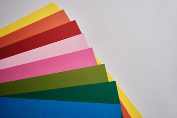  Abstract texture of colored paper. Geometric shapes and lines in bright colors. Place for text. Multicolor abstract flat lay. Back to school concept. Copy space, top view