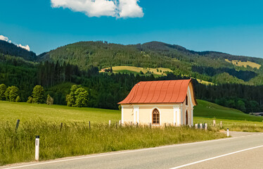 Alpine summer view with a chapel at Brixen im Thale, Kitzbuehel, Tyrol, Austria