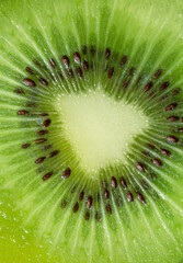 macro kiwi background,Kiwi Macro,Fresh Kiwi fruit sliced use for background,slice of kiwi fruit on a full frame. horizontal format