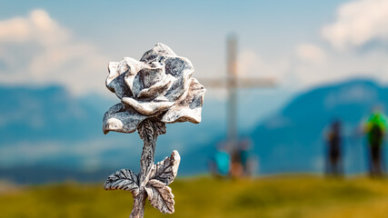 Details of a stone rose with a summit cross at Mount Markbachjoch, Brixen im Thale, Kitzbuehel, Tyrol, Austria