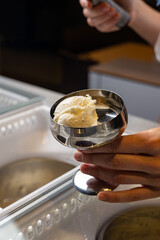 Delicious ice cream in a confectionery shop. Close-up