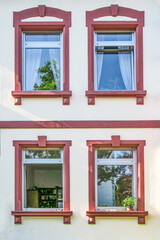 detail of classicistic window at house facade