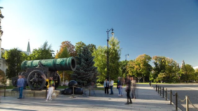 Tsar pushka monument. Tsar Pushka - huge ancient cannon in Moscow Kremlin timelapse heperlapse Russia. Park with green trees on a background